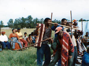 Sotho youths playing with sticks